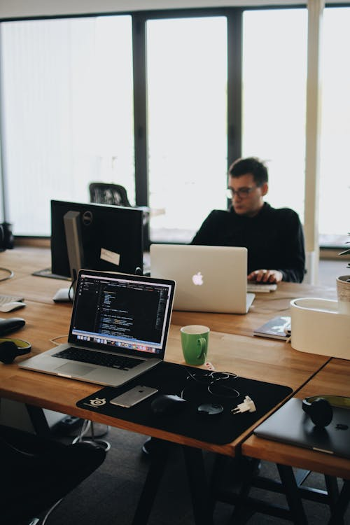 a man using his computer.