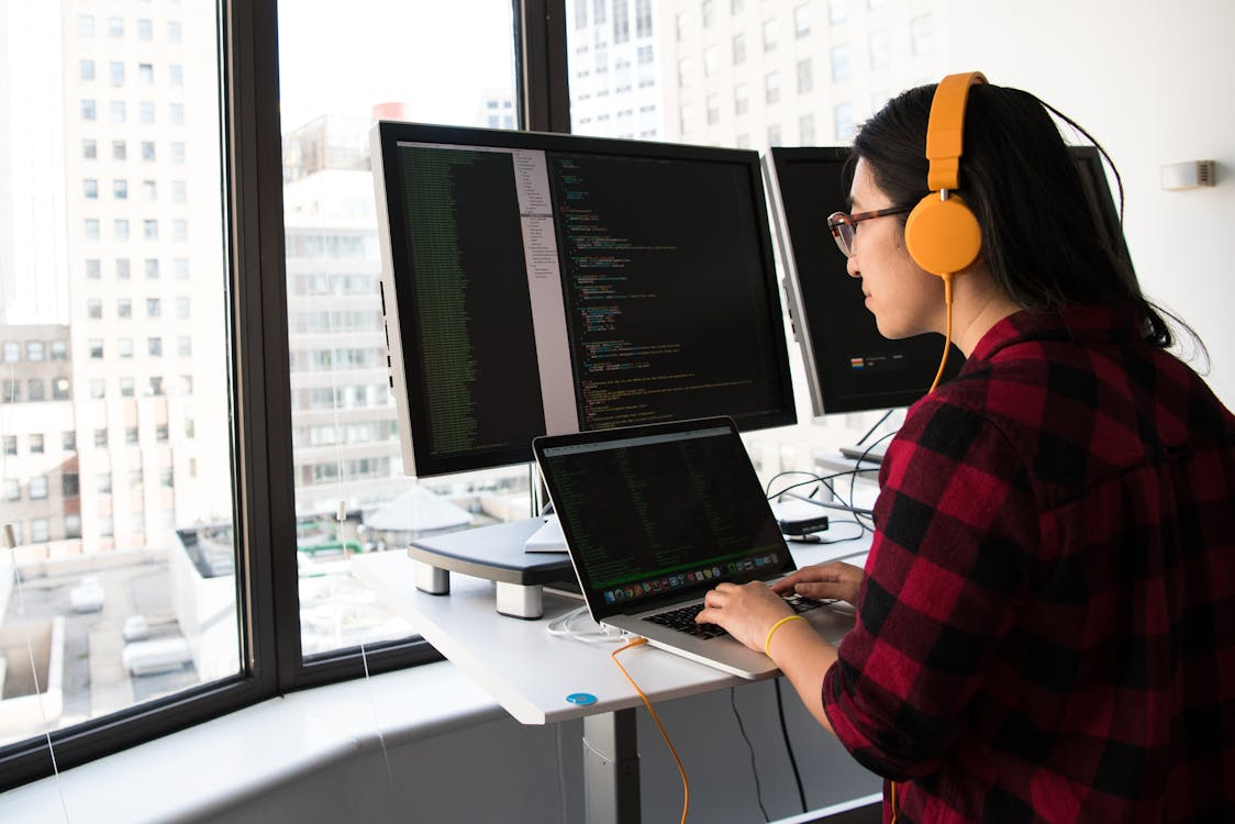 a woman using her computer.